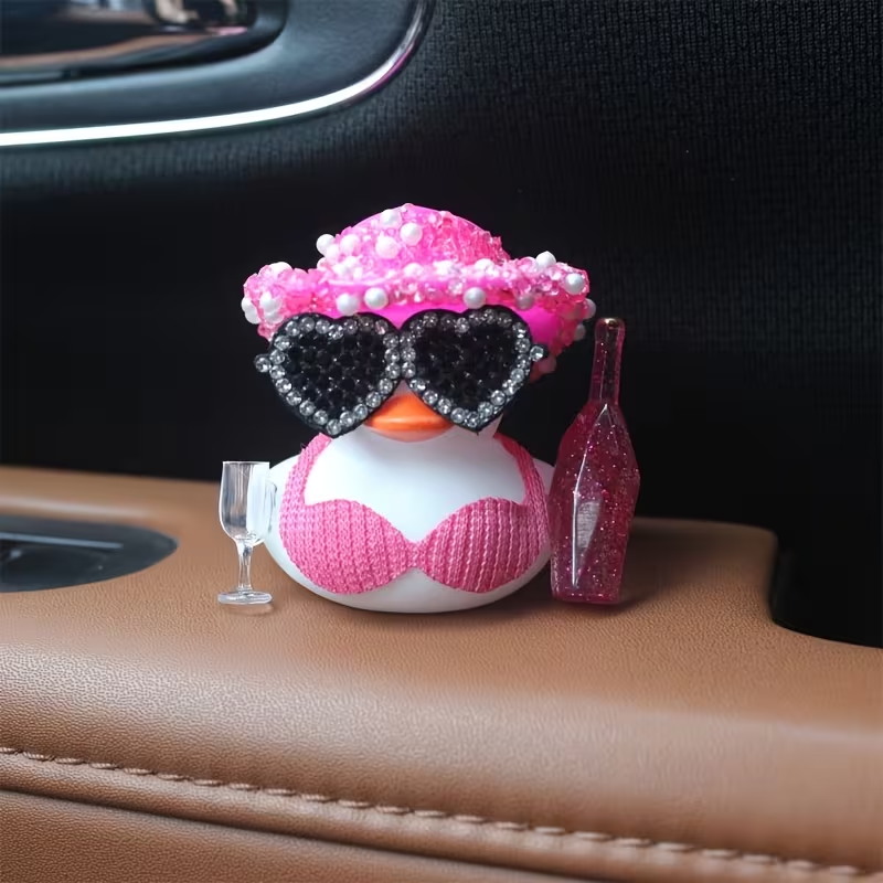おしゃれで光沢のある小さな黒いアヒル、車のセンターコンソール - Art Craft Glasses のレビューと価格