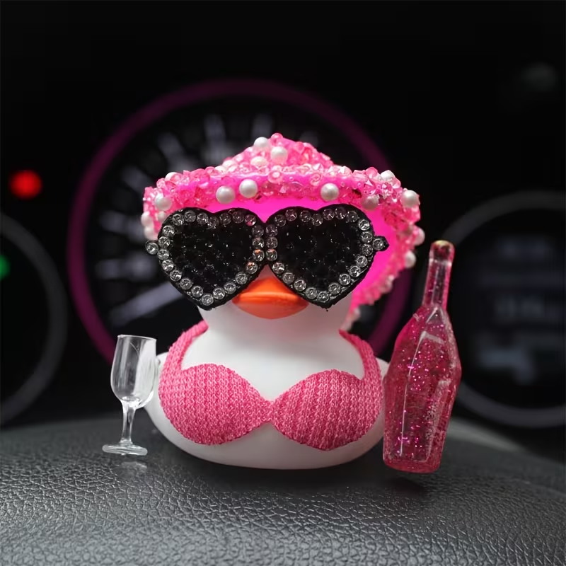 おしゃれで光沢のある小さな黒いアヒル、車のセンターコンソール - Art Craft Glasses のレビューと価格